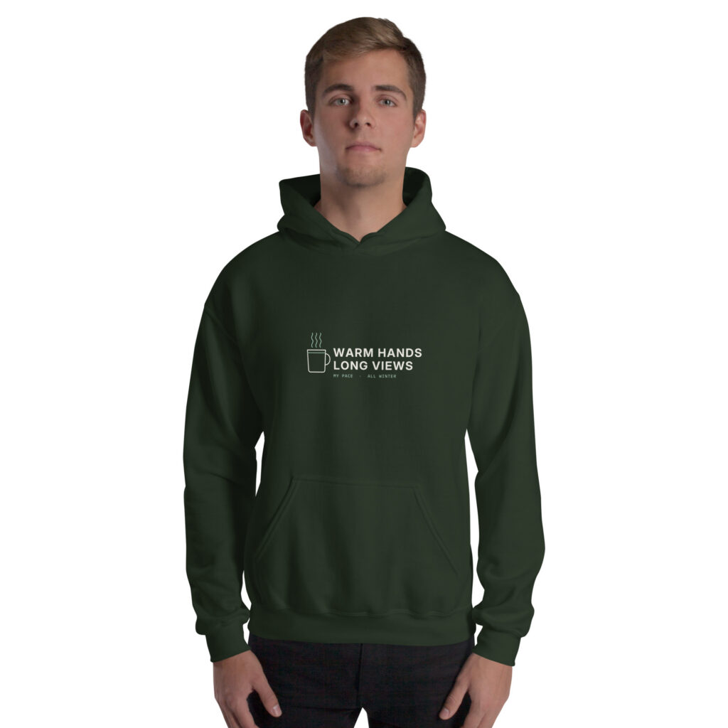 Forest Green Warm Hands, Long Views hoodie, front on model
